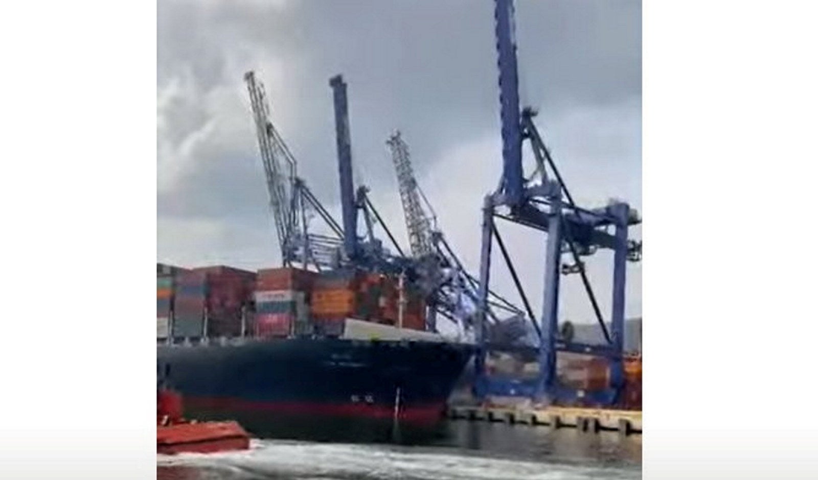 Out-of-control container ship crashes into three cranes