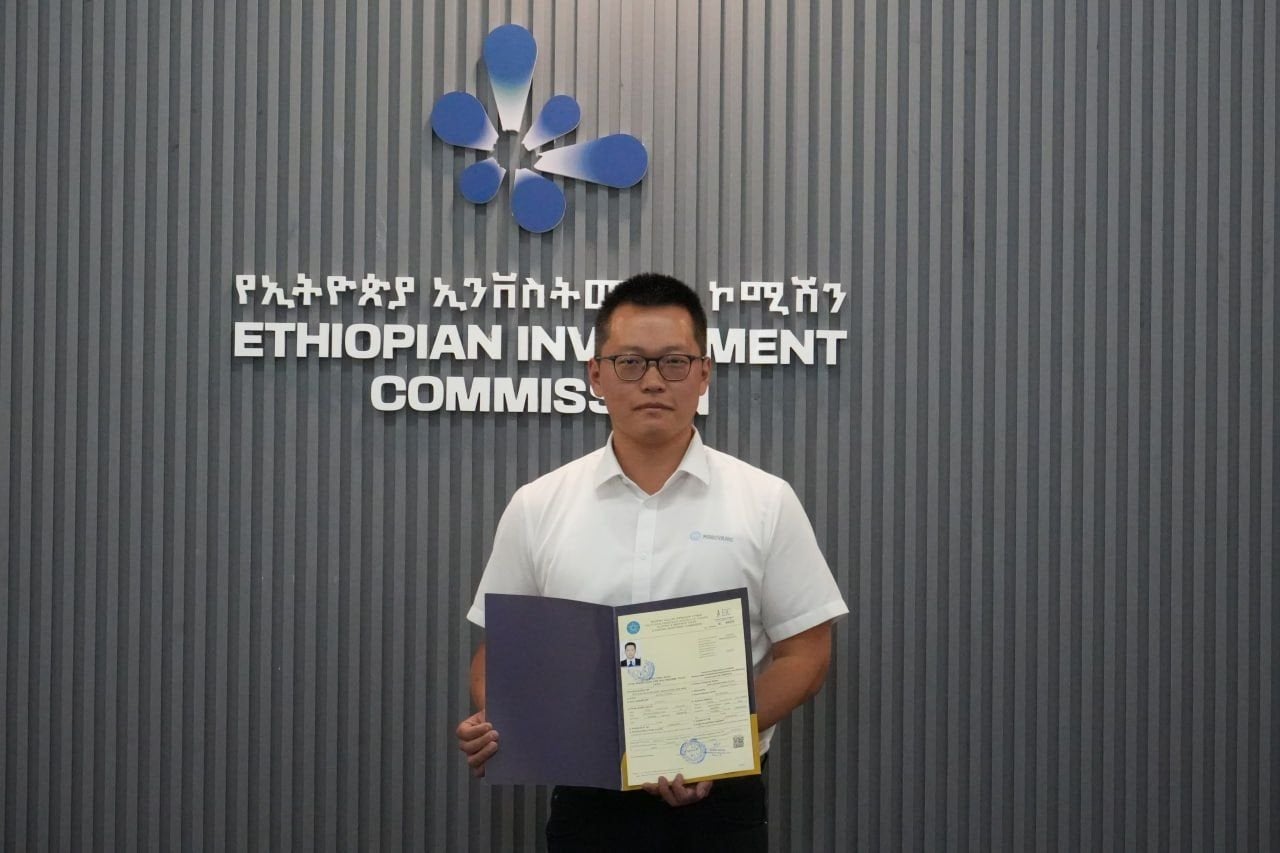 A representative of Ming Yang with the investment license