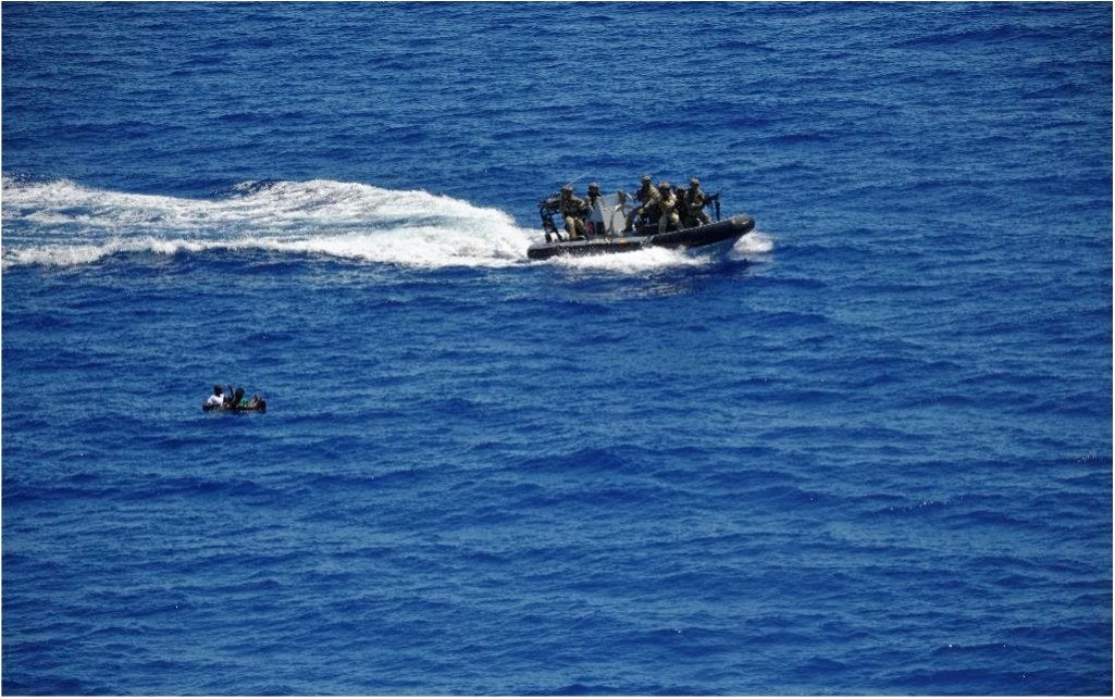 Turkish forces storm hijacked ship killing 14 Somali pirates