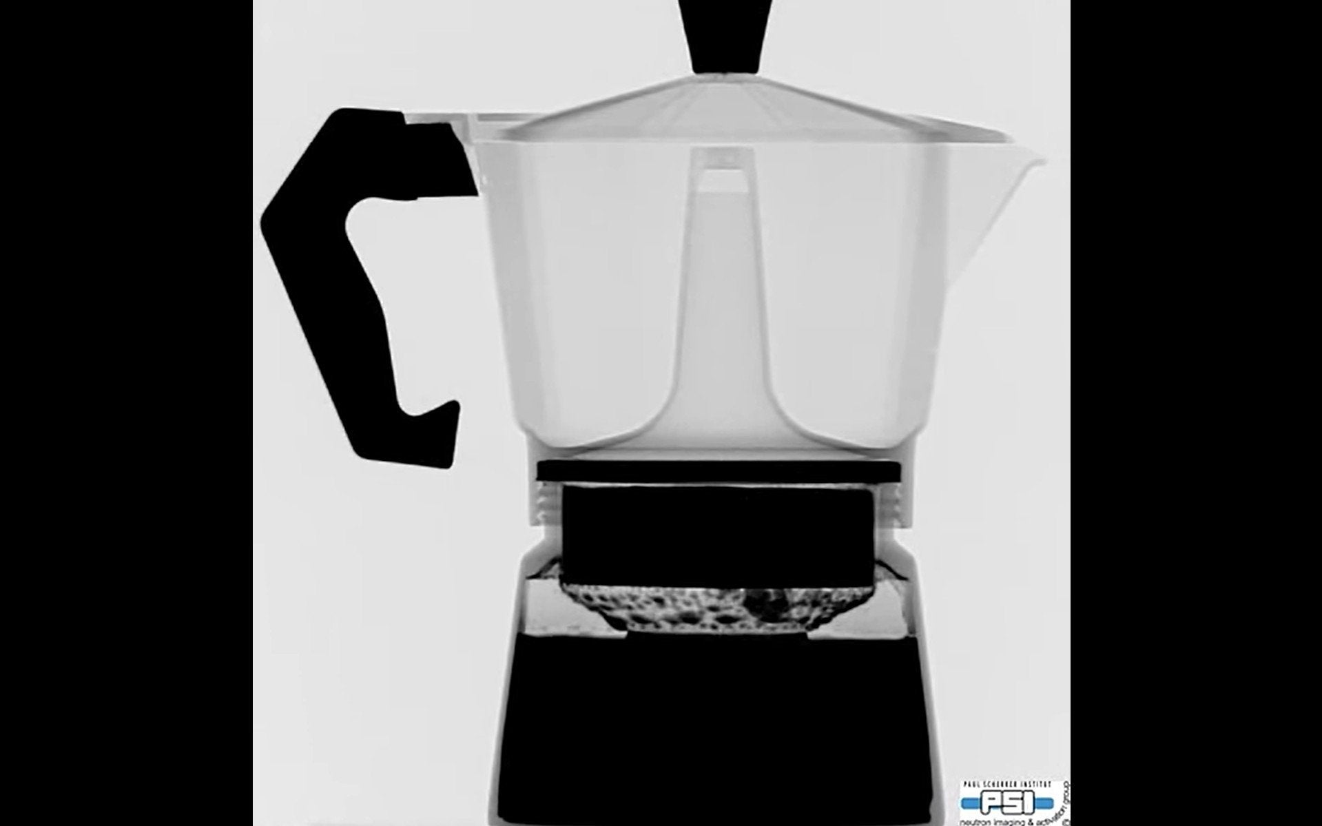 A still from a video showing neutron imaging of water bubbling away inside a metal coffee pot. This would not be possible with an X-ray.