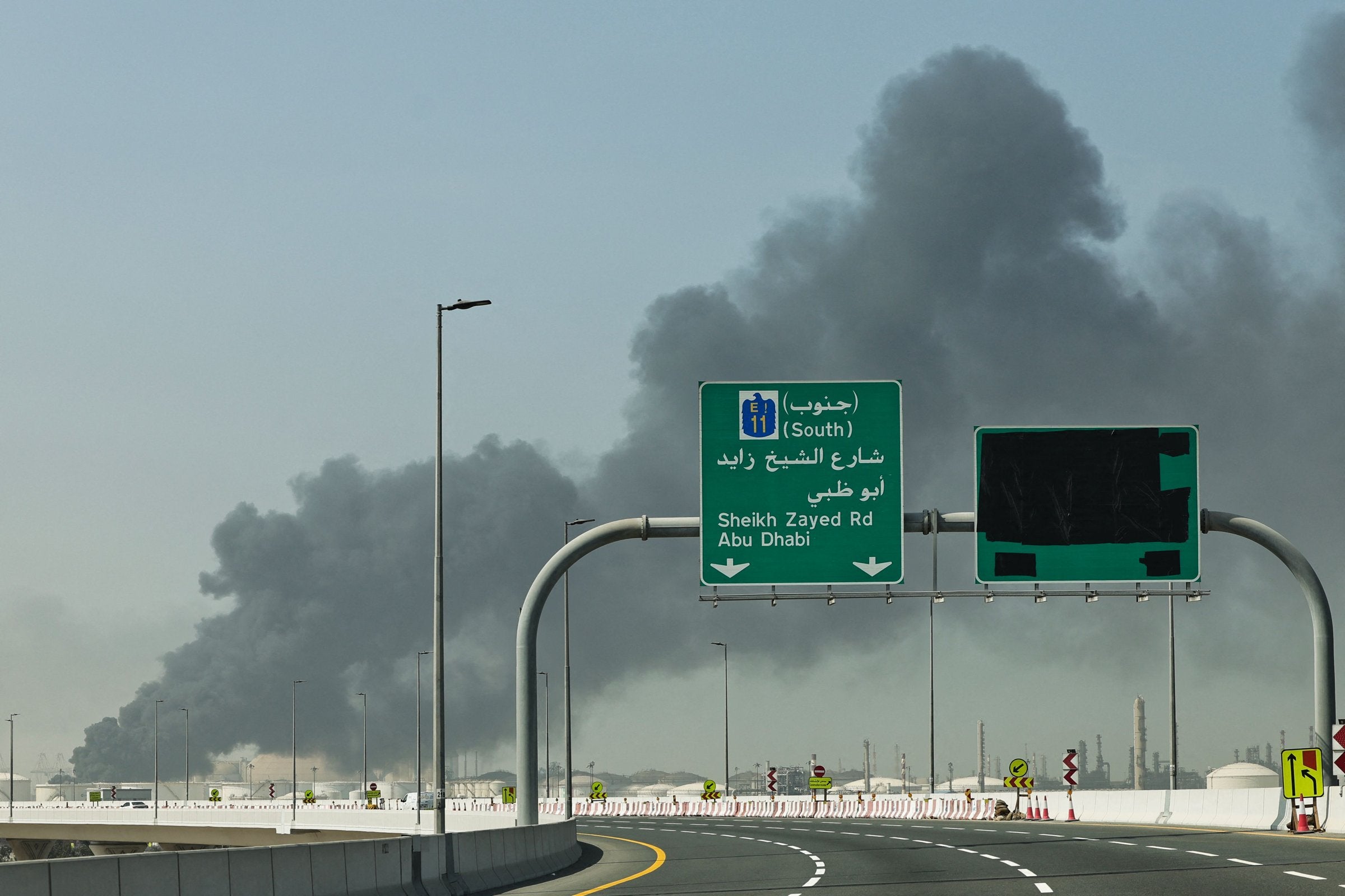 Smoke rises from the port of Jebel Ali following a reported Iranian strike on Sunday.