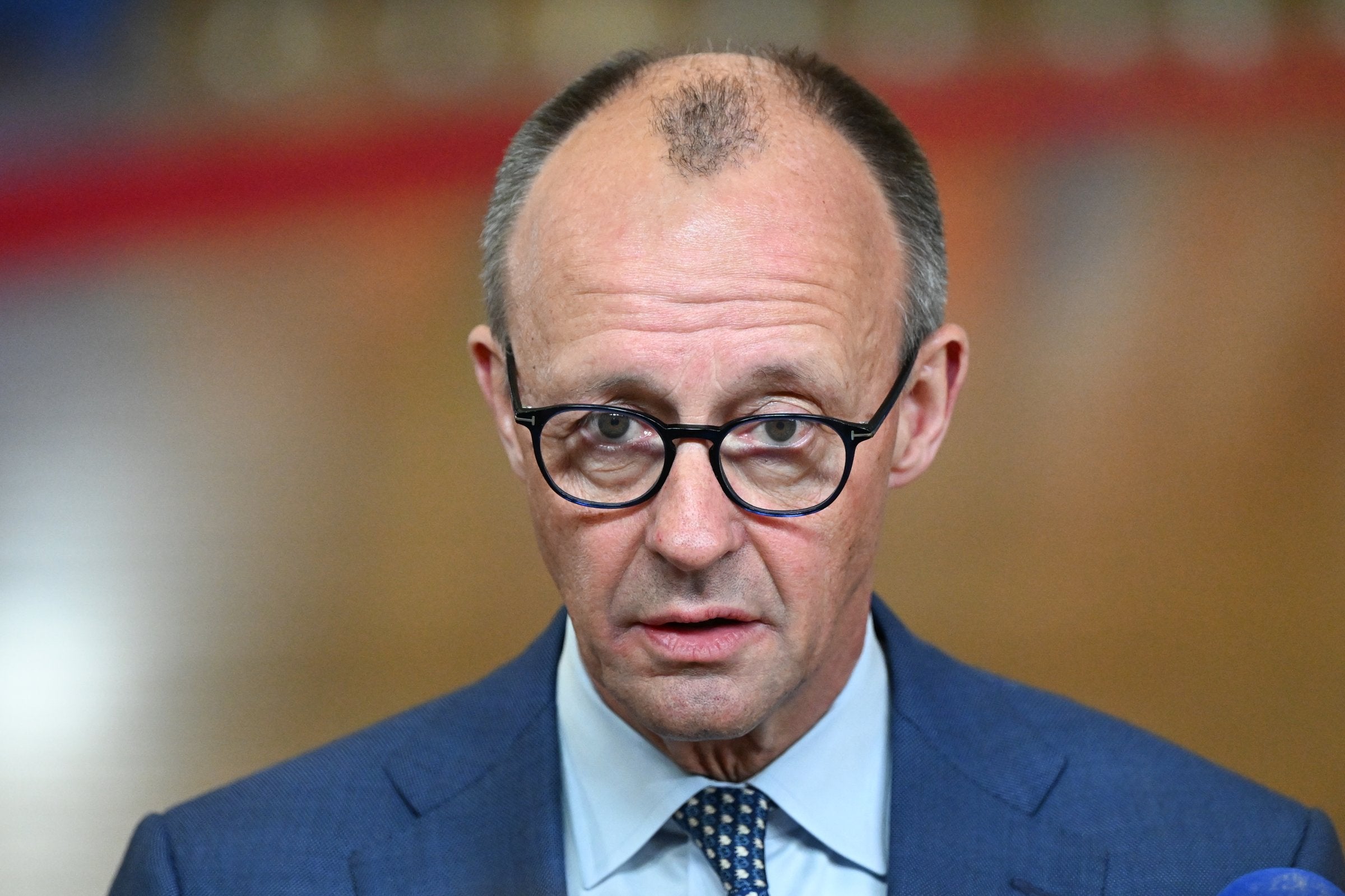 Merz says wind power is a 'transition tech' that will become redundant